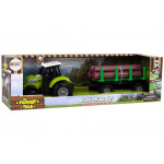 Zelený traktor s prívesom